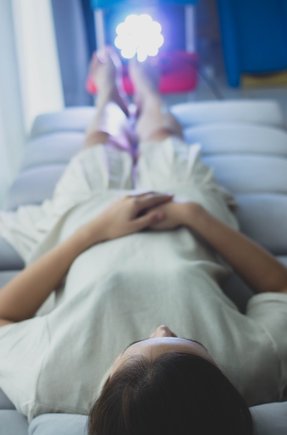 Light Mandalas AuraSync projecting light therapy to reflex points for energy balance.