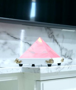 Mandala Resonator emitting red light for space harmonization and energy balance.