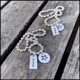 Kularmband m Berlock