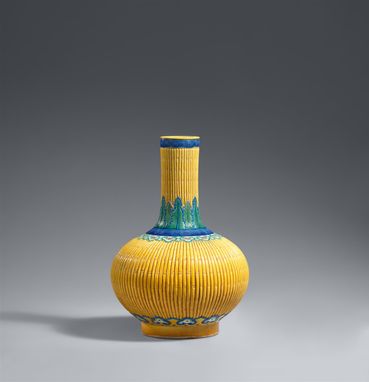 A yellow-ground vase with bamboo decoration.