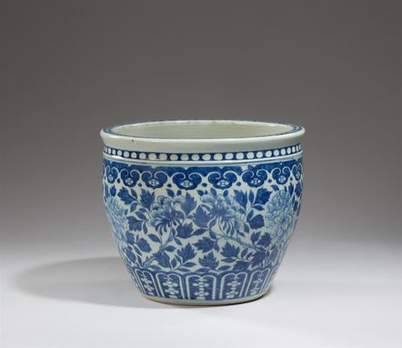 A blue and white jardinière.