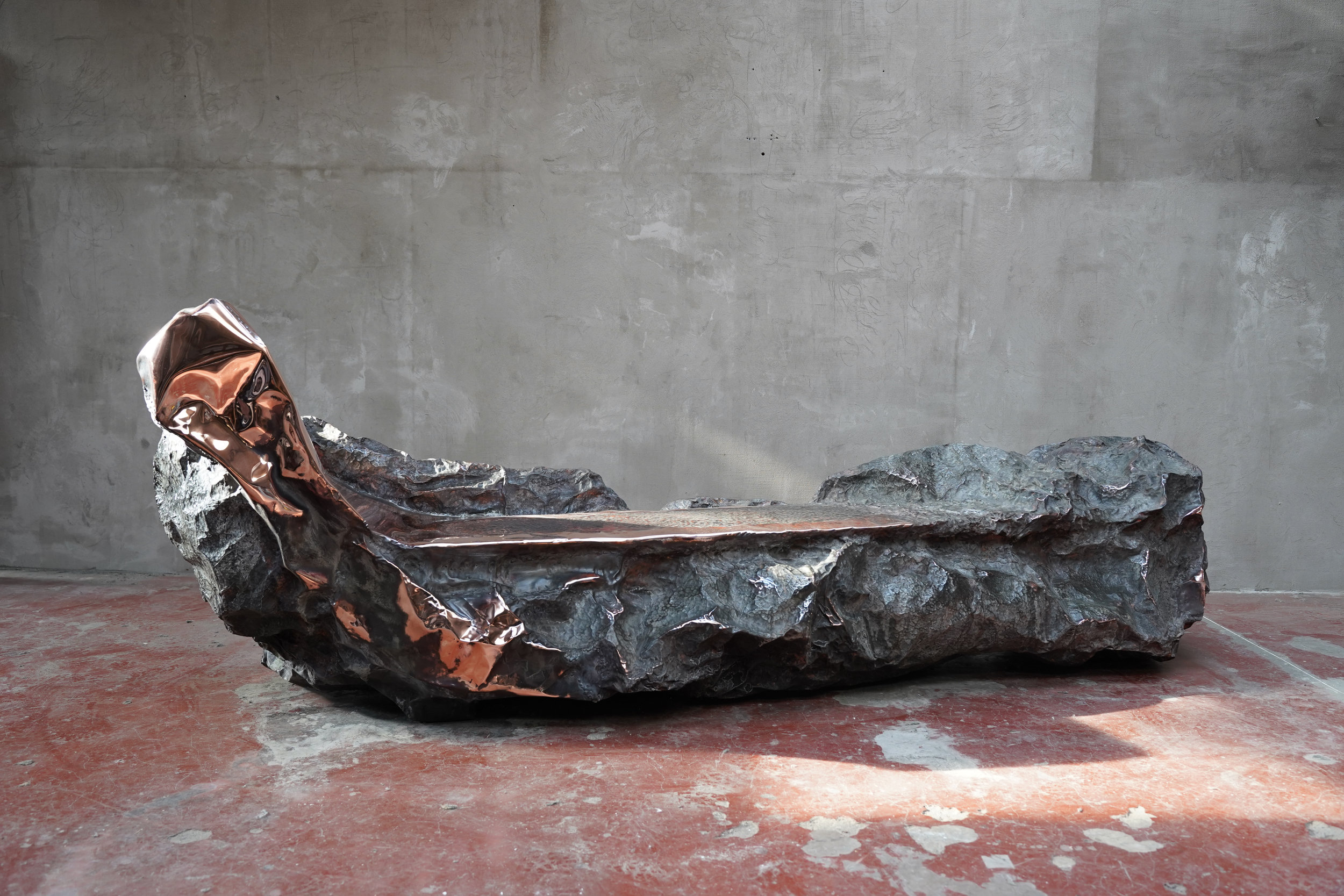 Meteor at Rest, contemporary sculpture by Marius Ritiu, hand-hammered copper, 2025