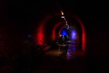 Series ' City Trails ' Walking in a sewer