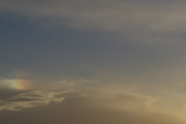 Zicht over de IJssel heen. De sneeuwwolken komen eraan gedreven.