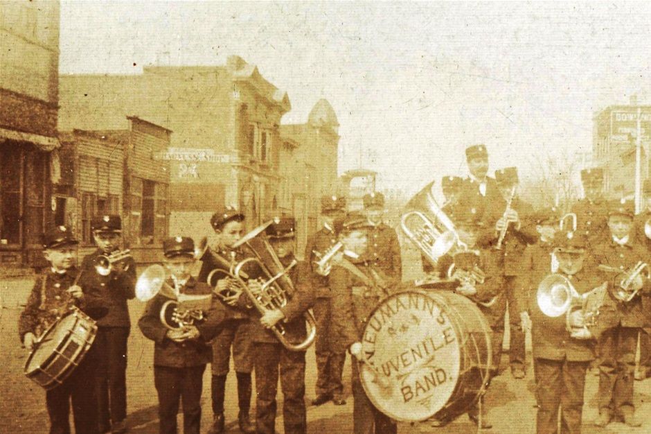 Neumann's Juvenile Band on Main Street.    This photo's individuals look very similar to the band photo in the 1906 book.  A news item in the March 10, 1904 