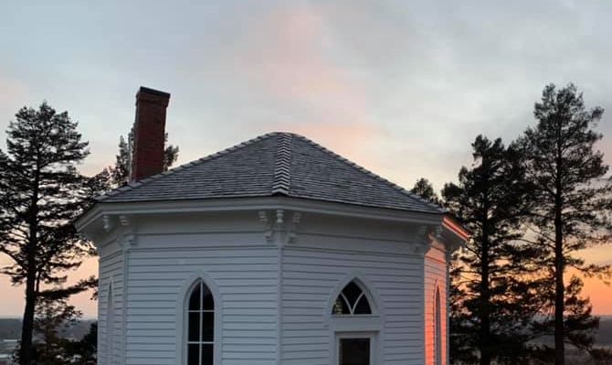 December 26, 2019.  Avoca’s Graceland Cemetary Octagon Building renovation project is officially complete!  Today Terry K. Philips of T.K. Enterprises installed the final windows. Pat Martin of Martin & Sons Construction was the primary contractor under Architect Peter Franks of The Franks Design Group. The Avoca city staff with the help of Josh Guyer of Guyer Concrete & Wall Systems provided the landscaping expertise.  (Courtesy Bill Dea)