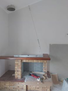 INSTALLAZIONE DI CAMINO