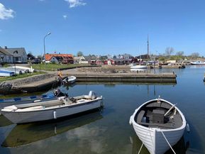 MusB Rofylld roddbåtsbild Södra hamnen från piren