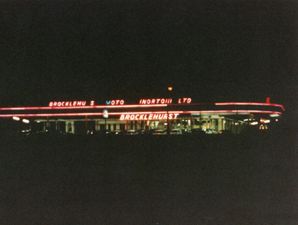 JE37 Brocklehurst Motors, Meadowhead Crossroads, at night.  