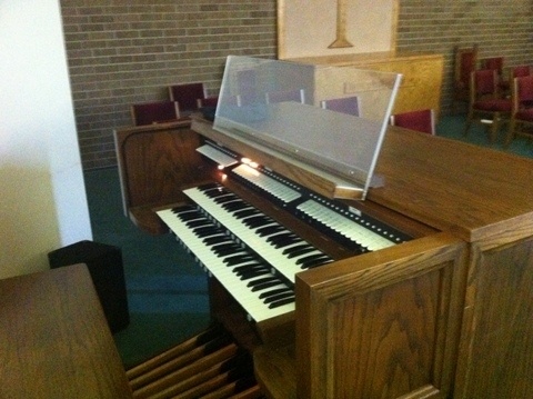 (con't from Part III)
If and when the student's interest takes a hard turn to the classical side, it's time to consider a practice instrument for the home that's built and voiced to play classic music.
For this purpose, the Baldwin model 636C classical organ (photo) was pretty decent for an analog organ built during the 1980's.
It was the top of the line 2 manual organ Baldwin made at the time, and it came with a 5 channel external audio system.
This organ used a rather good microprocessor system that handled all the keying, stop control, combination action, transposer, and other console functions.
The tones were generated by garden variety frequency components, but the 636 had several sets of oscillators and dividers, which made it sound like it had a more sophisticated generator system than it did.
Its sound compared favorably to analog Allen and Rodgers organs.
One of the divider sets was tuned very sharp from the rest to drive the celeste stops, and it gave a very rich celeste.
The other divider sets were tuned a few cents sharp or flat from each other, so you got an interesting amount of beating among the various stops.
The Baldwin engineers even went so far as to draw different octaves of the unit principal from different sources so that adding the 4-foot and 2-foot stops to the 8-foot principal gave a convincing effect of multiple ranks.
The stop list was rather complete and standard, much the same as you'd see on a typical Rodgers classical, all the usual stops at the usual pitches, all 4 families of tone plus chimes and harp and a single 32-foot flute in the pedal.
The stop action was Baldwin's 