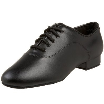 (con't from Part III)
Dancer's shoes are very similar to organ shoes, and since there are more dancers than organists in the world these may be easier to find, but not every dancer's shoes are a good fit for the organ.
The Capezio SD103 men's social dance shoe for ballroom or character use (photo) is an example of a men's dress shoe that would make an acceptable organ shoe.
This is a lightweight shoe with a 1-inch standard heel that's available in both wide and medium sizes; these might also be worn into and out of the building without wearing out the soles.
The soles of these shoes would need to be kept perfectly clean however, so that dirt and grime are never transferred to the pedal keys.
This is the type of shoe preferred by this author.
We need to be able to 