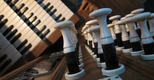 (con't from Part XI)
Generally an organist must wait for cues to begin playing, and this is especially true when serving Masonic organizations.
This presents a number of challenges, not the least of which is that the Mason on the organ bench must know the ceremony or work at hand well enough to know 1) when to expect to play, 2) for how long, 3) what has to be performed (choral accompaniments, incidental music, repertoire, etc.), 4) what type of mood, if any, the music is expected to portray, and 5) how much advance preparation and practice will be needed, among other things.
This is not as easy as it sounds.
Let's be clear: it's no accident, ever, when the music sounds well; it's the result of discipline, sacrifice, and hard work, plain and simple.
Those listeners who think that an organist can just sit down to a colossal affair like this (photo), turn it on, and by some mysterious process a stream of inspired sound will emerge from the instrument automatically simply because the bench is being occupied -- that all a Masonic musician has to do is simply show up at the event, sit on the bench, have a good time, and go home without doing any of the heavy lifting -- that a brother with a modicum of talent can 