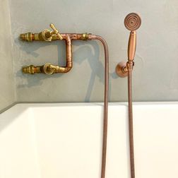 Koperen badkraan met handdouche