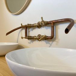 Dubbele wastafel kraan van koper