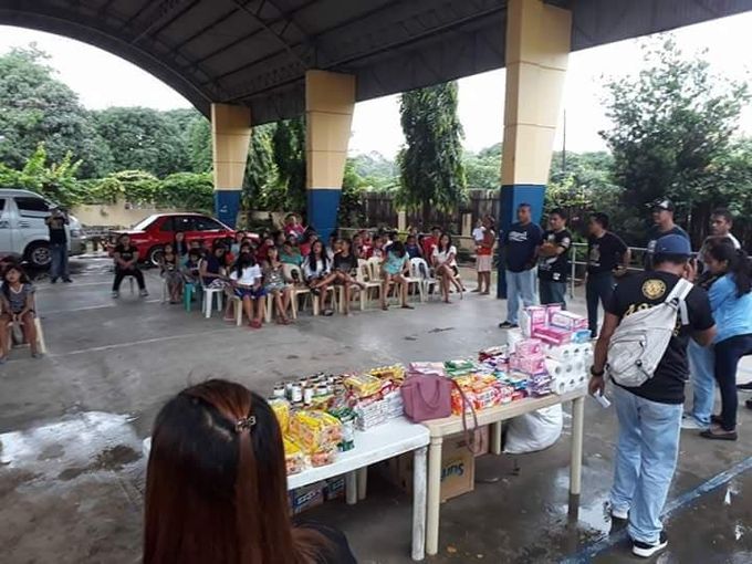Triskelions providing booty at the children's home in Palayan.