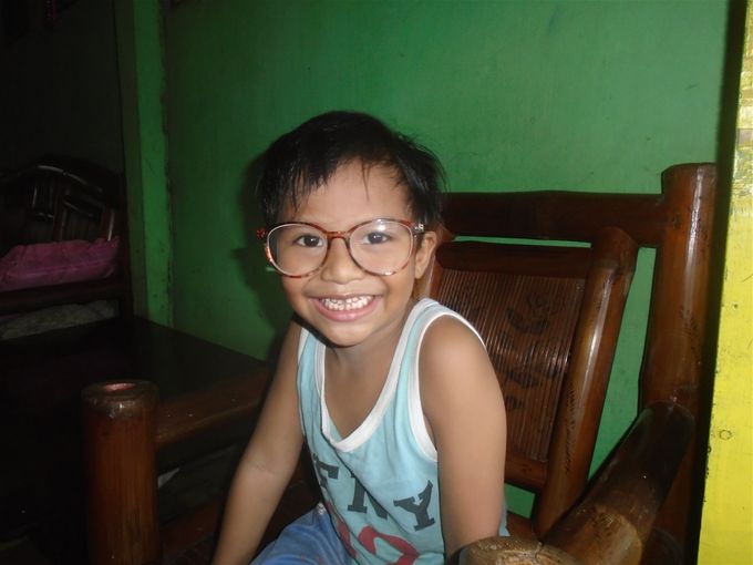 Aaron tries on my reading glasses..