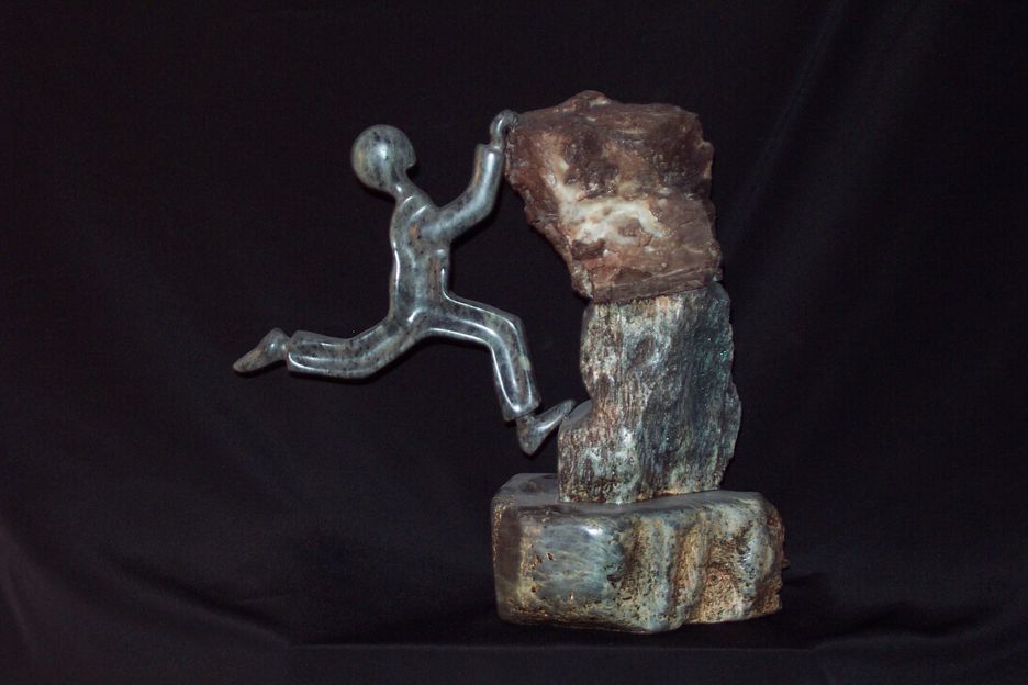 ROCK CLIMBER
                               by  *  par
                     Eugene Jankowski
                   Steatite  30x25x20cm                    N$