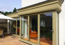 Reynaers Aluminium bifold doors in bespoke RAL 7034