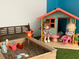 The play house and new sandbox.