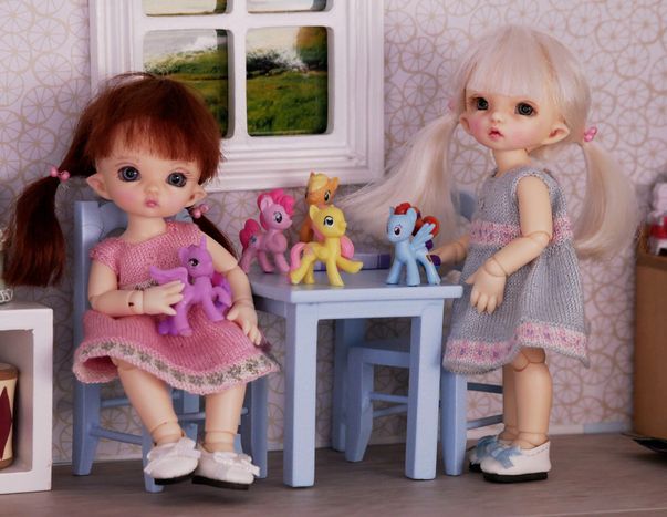 Trying on their dresses