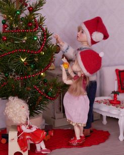 Finding the perfect branch for your favorite ornament.
