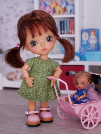 Borrowing grandmas doll stroller.
