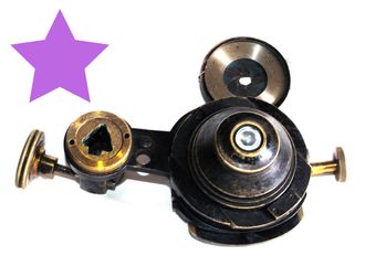 Antique microscope shifting condenser