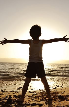 Silhouette of child on the beach,oak