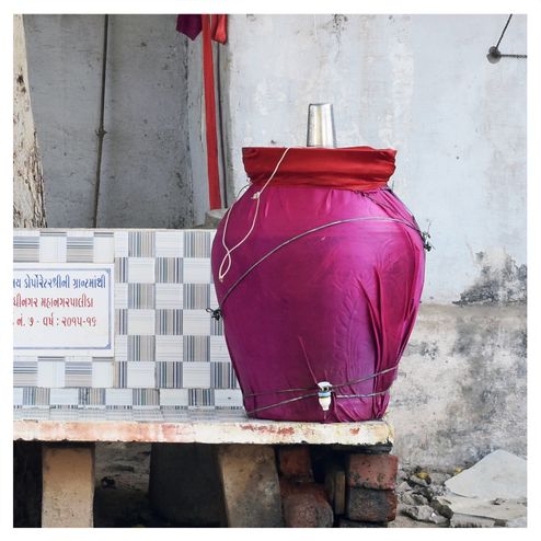 MATKA IN PINK & RED CLOTH
