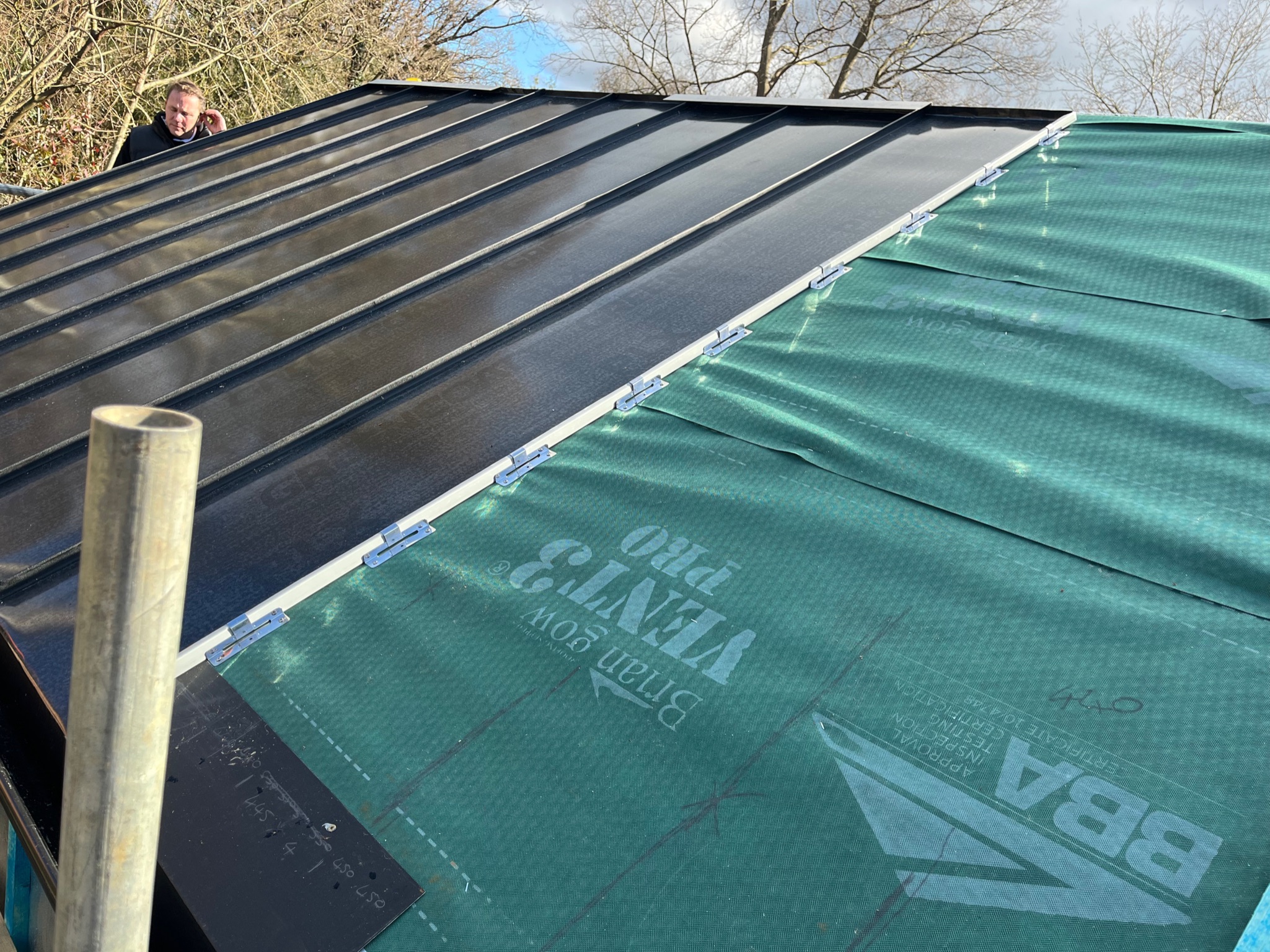 Standing seam steel roofing