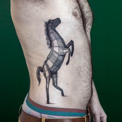 geometric horse tattoo
