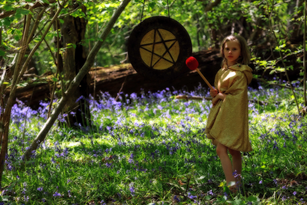 PLAYING A STEVE HUBBACK GONG IN THE BLUEBELLS