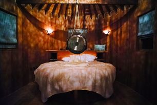 SPECIAL ROUND GONG IN A ROUND HOUSE WITH A ROUND BED