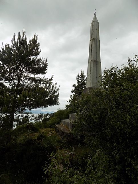 The Murchison Monument on Loch Duich. You can just make out the bridge over to Skye, and the island's mountains in the gap at the bottom of the tree