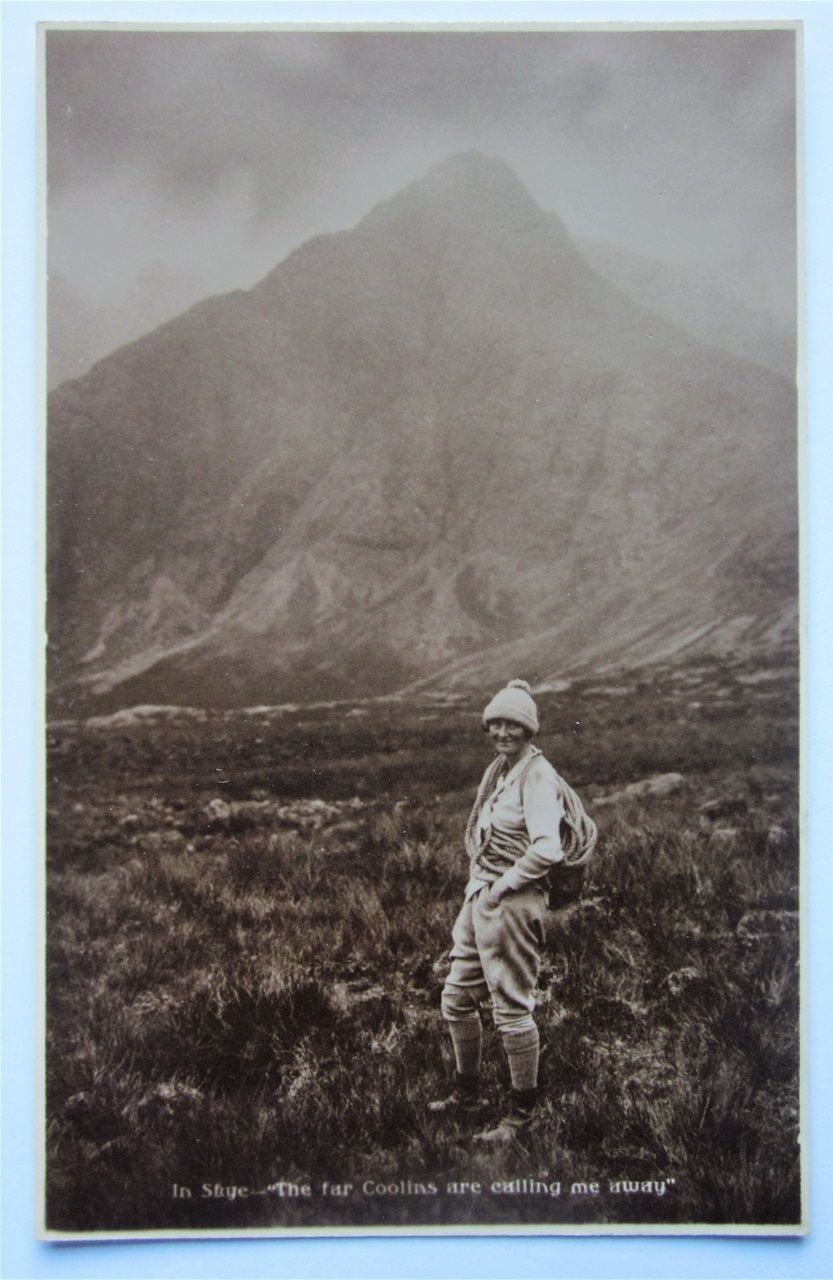 Unknown female climber, rope at the ready.