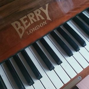 Berry walnut art deco upright piano 