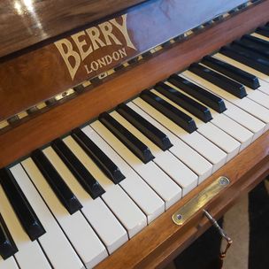 Berry walnut art deco upright piano 