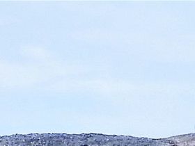 Vissa berg var märkligt gråa till färgen (ej snö)