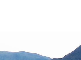 Skipsfjord; Scandic Hotell (i förgrunden) samt Nordkapp Camping (inkl stugor)