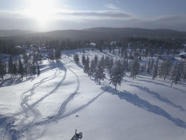 Pulkabacken med Orsasjön och Mora i fonden (solen)