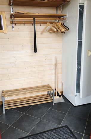 Hall vid entrén med torkskåp
