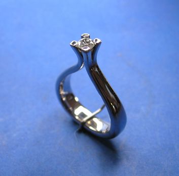 14 karat ring med 0,61 ct.
