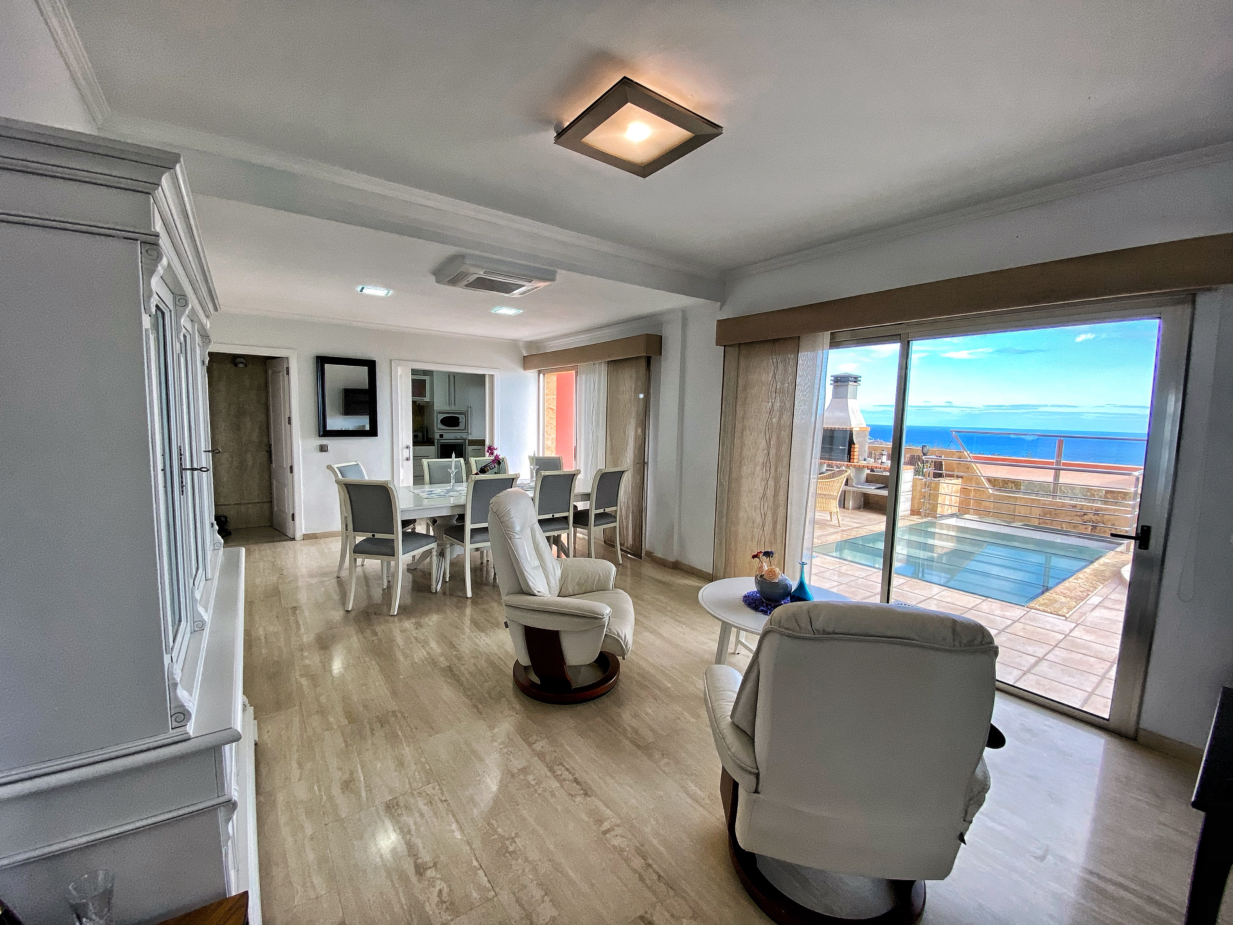 Two leather armchairs with outstanding views.