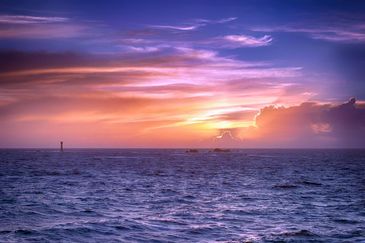 AC 105 - Lighthouse at sunset, Guernsey - stunnig sunset - art prints 