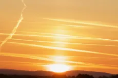 MC 19 024 - Sunrise over Cornwall - a-plane-flying-in-the-sky-at-sunse