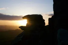 MC 19 026 - Hound Tor as the sunrise - a-person-standing-on-top-of-a-m