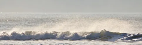 MC 19 057 - waves - a-surfer-is-riding-a-wave-in-the-ocean
