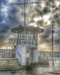 MC 19 059 - moody skies - a-boat-sitting-on-the-dock-with-a-cloudy-sky