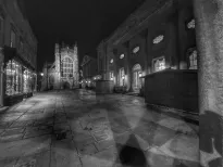 MC 20 091  - a-black-and-white-photo-of-a-street-at-night