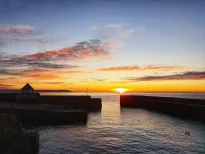 MC 20 095 - Sun up Charlestown Cornwall - a-sunset-over-the-ocean-with
